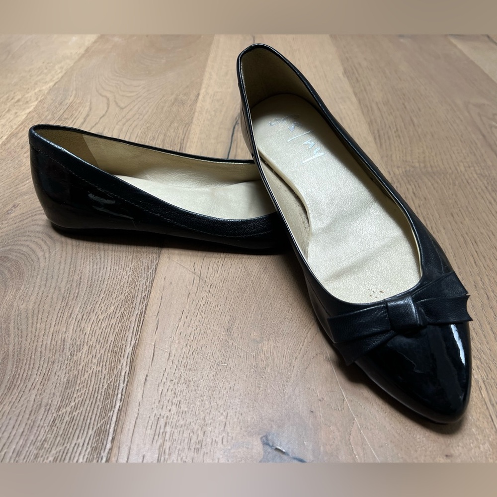 French Sole black patent leather flats with a bow and leather details in Size 7